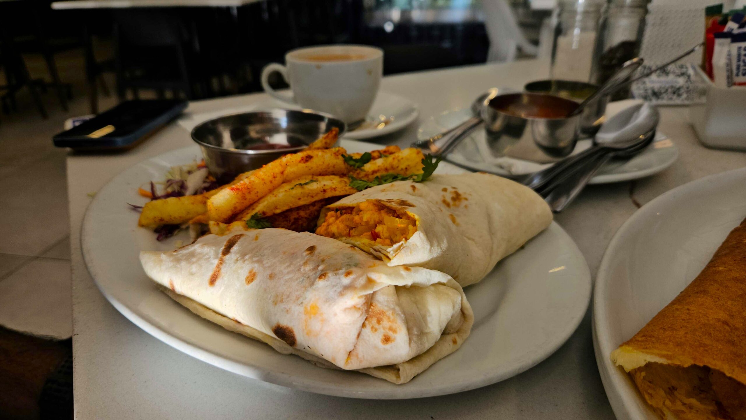 Indian food Johannesburg paneer roll with chips